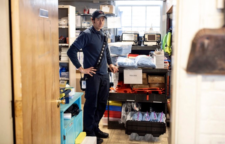 South Portland Deputy Fire Chief Phil Selberg shows the supply room at the Central Fire Station that houses personal protective equipment. Selberg said EMTs respond to several respiratory calls, potential COVID-19 cases, every day. "I would liken it to a hazmat call," he said.