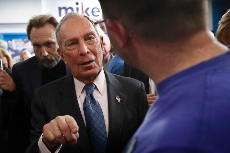 Democratic presidential candidate and former New York City mayor Mike Bloomberg speaks to a voter in Scarborough in January. Bloomberg has been the only major candidate to campaign in Maine in recent weeks. Maine holds it's primary on Super Tuesday, March 3.