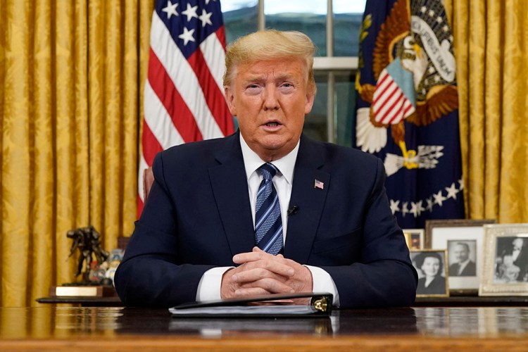 President Trump addresses the nation from the Oval Office about the coronavirus on Wednesday night, announcing his plan to contain it and offset its impact in the U.S.