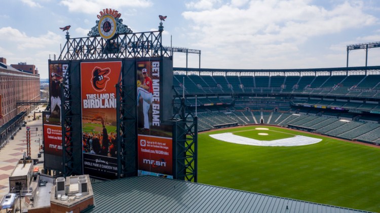 Camden Yards in Baltimore, like every other park in the majors, was empty on Thursday, which was supposed to be Opening Day. Baseball players and owners reached an agreement in the wake of the coronavirus pandemic, for how to handle a season once it is OK to play, or if the season is canceled. 
