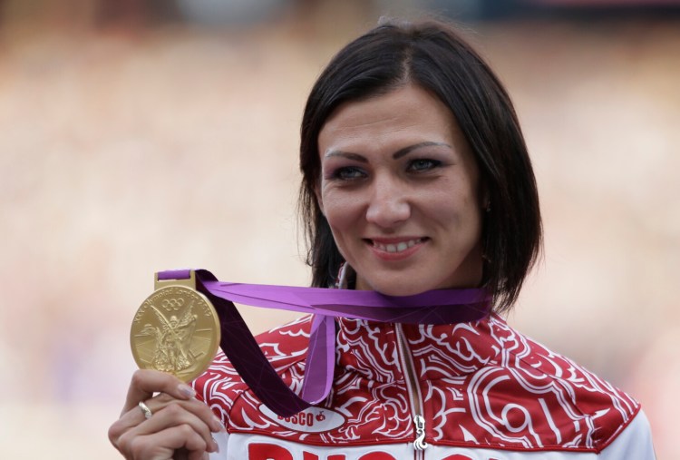 Russia's Natalya Antyukh, who won the gold medal in the 400-meter hurdles at the 2012 Olympics, was one of four Russian track and field athletes charged with doping violations on Friday. 