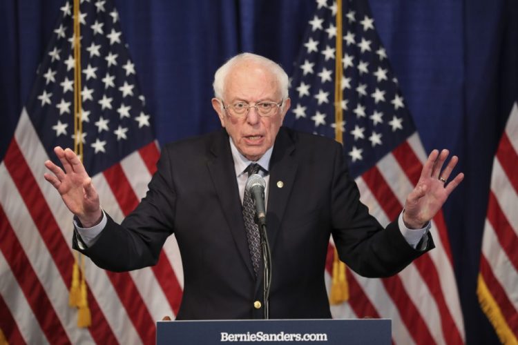 Democratic presidential candidate, Sen. Bernie Sanders, I-Vt., speaks to reporters on Wednesday in Burlington, Vt., where he said he intends to continue seeking the nomination. 