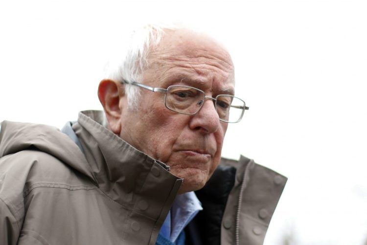 Democratic presidential candidate Bernie Sanders campaigns outside a polling location 
 in Detroit on Tuesday. His loss in the Michigan primary was a major setback for his campaign.