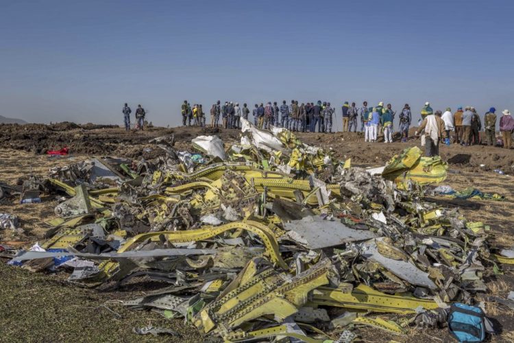 Wreckage is piled at the crash scene of Ethiopian Airlines flight 302 near Bishoftu, Ethiopia, on March 11, 2019. The year since the crash of an Ethiopian Airlines Boeing 737 Max has been a journey through grief, anger and determination for the families of those who died, as well as having far-reaching consequences for the aeronautics industry as it brought about the grounding of all Boeing 737 Max 8 and 9 jets, which remain out of service. 