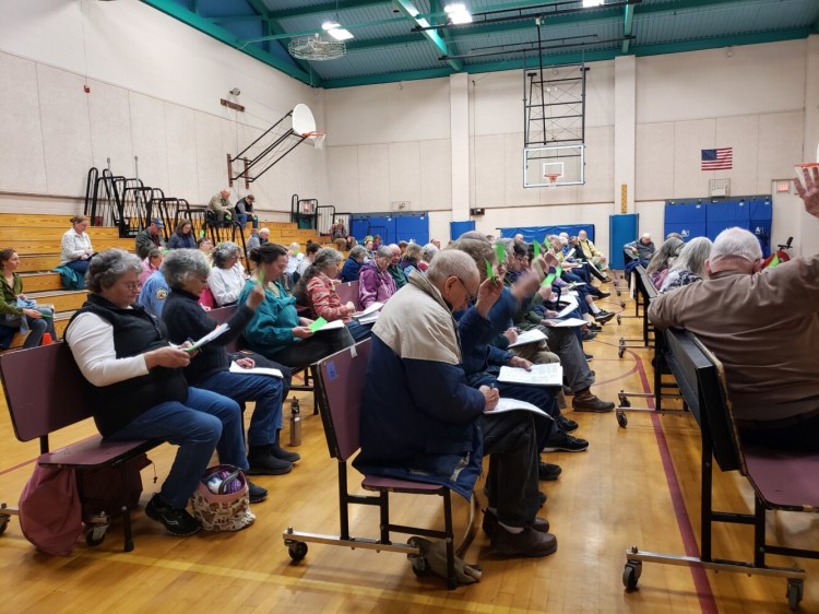 Nearly 75 voters turned out Saturday for the New Sharon annual town meeting.