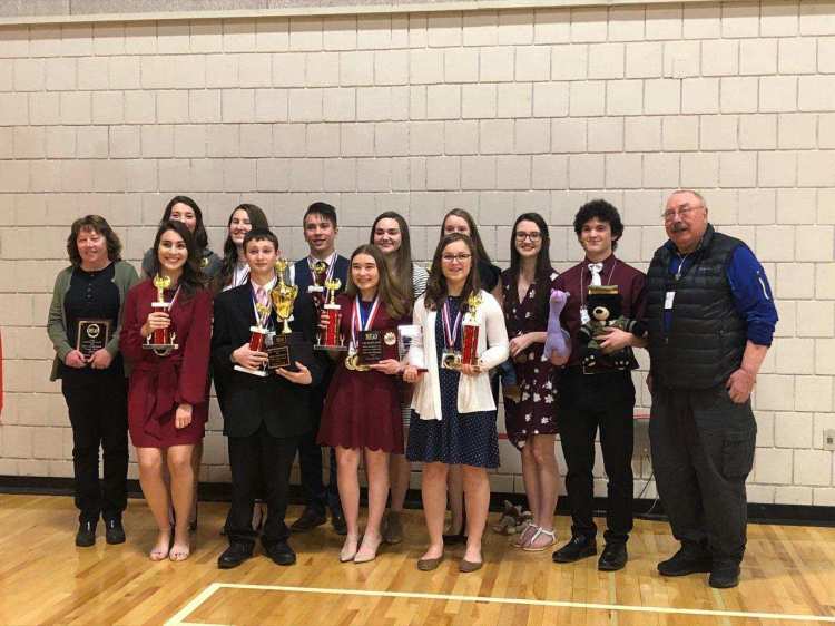 Monmouth Academy Academic Decathlon team front from left are 
Amber Currie, Ostin Hasenfus-Smith, Rhayna Poulin and Olivia Degen.  Back from left are Coach Cathy Foyt, Kaitlin Hunt, Natalie Grandahl, Ed Zuis, Delaney Houston, Holly Hunt Cammie Houston, Joe Crocker and Coach Scott Foyt
