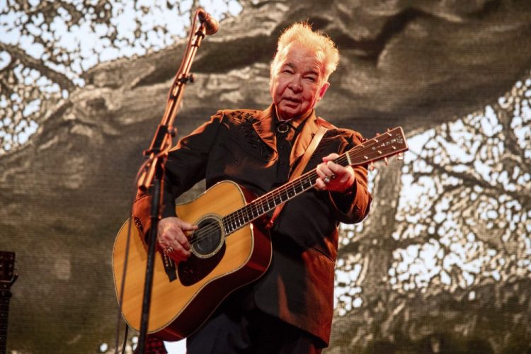 John Prine performs at the Bonnaroo Music and Arts Festival in Manchester, Tenn., in June.