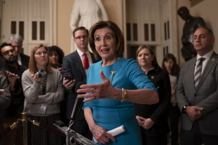 Speaker of the House Nancy Pelosi, D-Calif., on Friday ahead of a planned late-night vote on the coronavirus aid package at the Capitol in Washington.