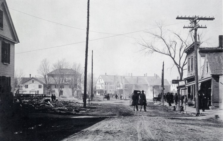 Morning of the Great Fire in Springvale, 1905. This photograph, taken by Fred Philpot, shows the destruction on both sides of Main Street. Philpot was a professional photographer with studios in Springvale and Sanford between 1887 and 1917.
