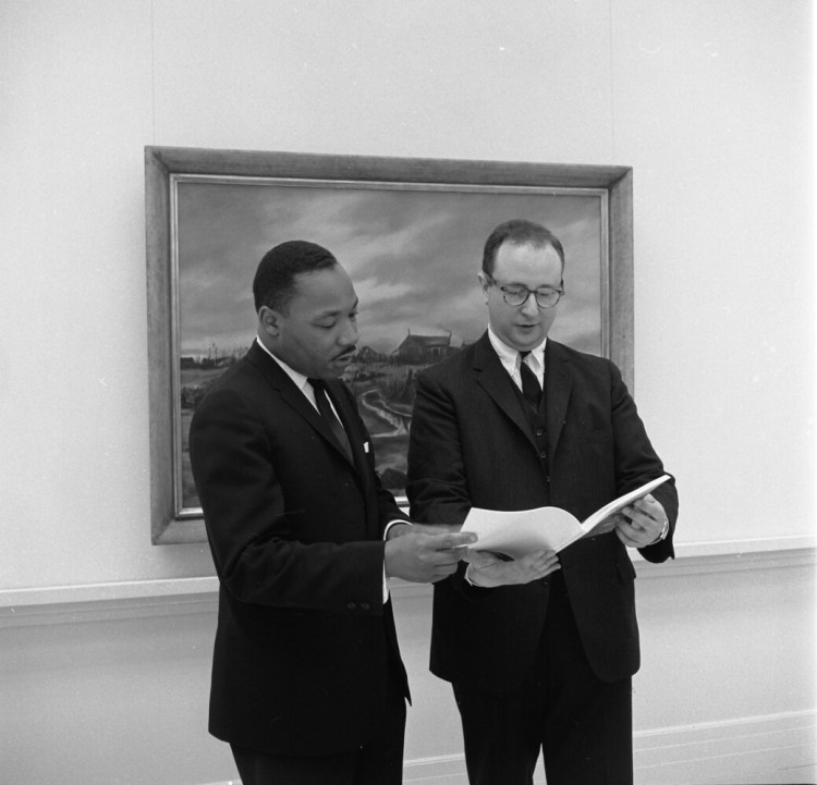 The Rev. Martin Luther King Jr., left, and curator Marvin Sadik, director of the Bowdoin Art Museum, as King toured the exhibition "The Portrayal of the Negro in American Painting” in May 1964.