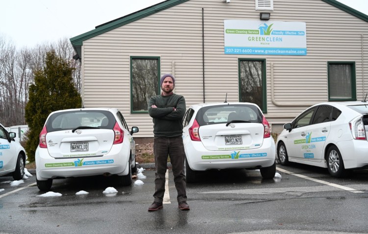 Joe Walsh, owner of Green Clean Maine, stands in front of his Portland business Friday. Walsh and other small business owners worry that a federal loan program designed to help businesses survive the coronavirus pandemic is too risky because borrowers are subject to strict spending rules and a tight deadline for full rehiring or retention of staff.