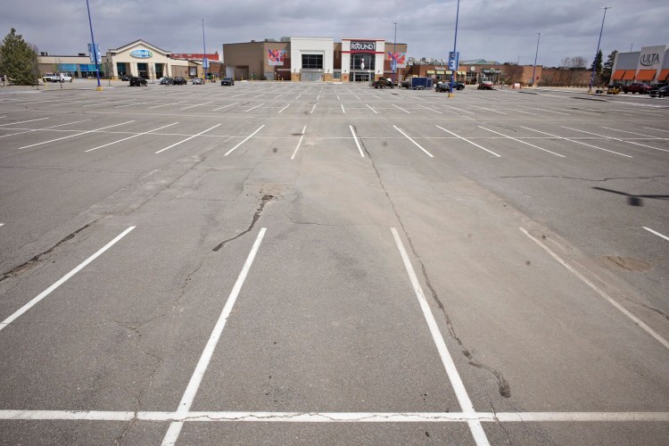 The parking lot of The Maine Mall in South Portland was nearly empty on April 22. The impact on South Portland from the loss of tax revenue due to the pandemic is uncertain, but sure to be felt, city officials say. 