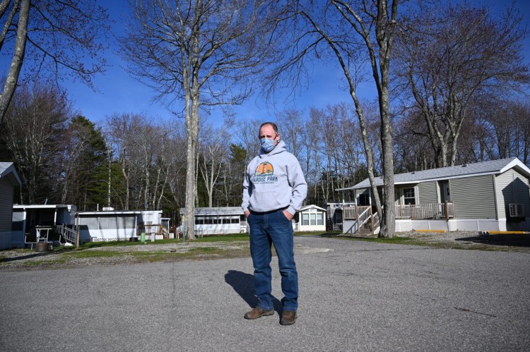 Mike Halle, owner of Paradise Park Resort Campground in Old Orchard Beach, stands in front of the property on Wednesday. Halle said the governor's reopening plan would cost him about 90 percent of his reservations for the summer because guests could not meet a requirement to self-quarantine for 14 days upon arrival.