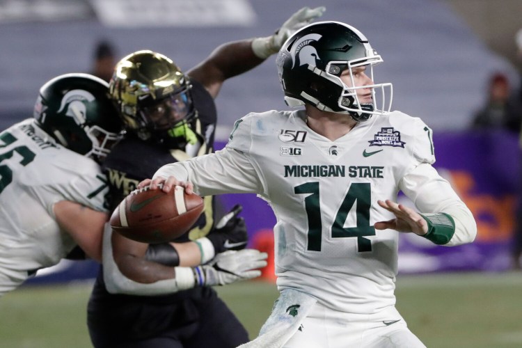 Michigan State quarterback Brian Lewerke signed as an undrafted free agent with the New England Patriots, according to his agent. 