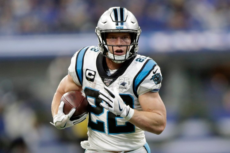 Christian McCaffrey rushed for 1,387 yards and had 1,005 yards receiving last season for the Carolina Panthers. He has reportedly agreed to a four-year, $64 million contract extension.