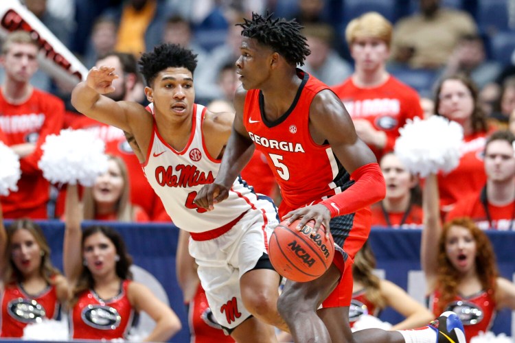 Georgia guard Anthony Edwards, right, is a potential top pick in the NBA draft, though no one knows when the draft will actually happen.