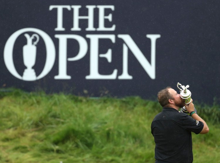 Shane Lowry holds and kisses the Claret Jug trophy after winning Tthe British Open last year. The organizers of the British Open announced Monday that they have decided to cancel the event in 2020 due to the current Covid-19 pandemic and that the Championship will next be played at Royal St George's in 2021. 