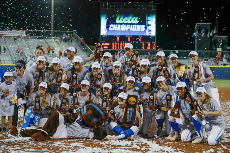 UCLA poses for photos after defeating Oklahoma in the Women's College World Series last year in Oklahoma City. The annual event has been hosted by Oklahoma City every year but one since 1990. Last year, it brought in an estimated $14 million to the city and its businesses. 