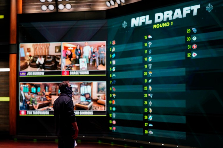 In a photo provided by ESPN Images, the draft board is seen before the start of the NFL draft on Thursday. The virtual draft went off well and drew large viewership.