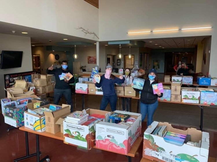 KV Connect members assist with delivery of children’s books to Educare Central Maine in Waterville.
 