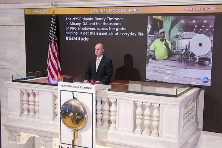New York Stock Exchange Chief Security Officer Kevin Fitzgibbons rings the opening bell on Thursday, while recognizing Randy Timmons in Albany, Ga., and thousands of employees of the Proctor & Gamble Company.