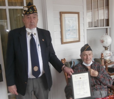 Raymond N. Soucy, 95, of Madison, left, was presented with a certificate from the American Legion National Headquarters for his 75 years of continuous membership with Tardiff-Belanger Post 39, Madison. H. Ralph Withee, past commander of Post 39 Madison, presented the certificate to Soucy on March 15.