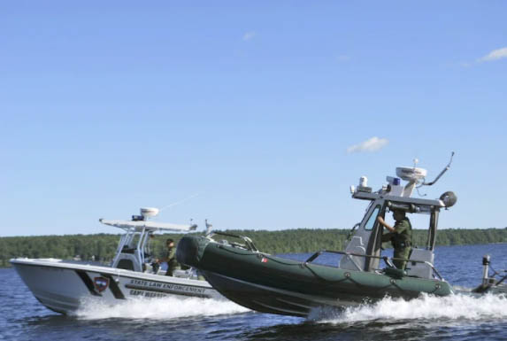 Maine game wardens go out in patrol boats in one of the first episodes of "North Woods Law." The show now focuses on New Hampshire's wardens.