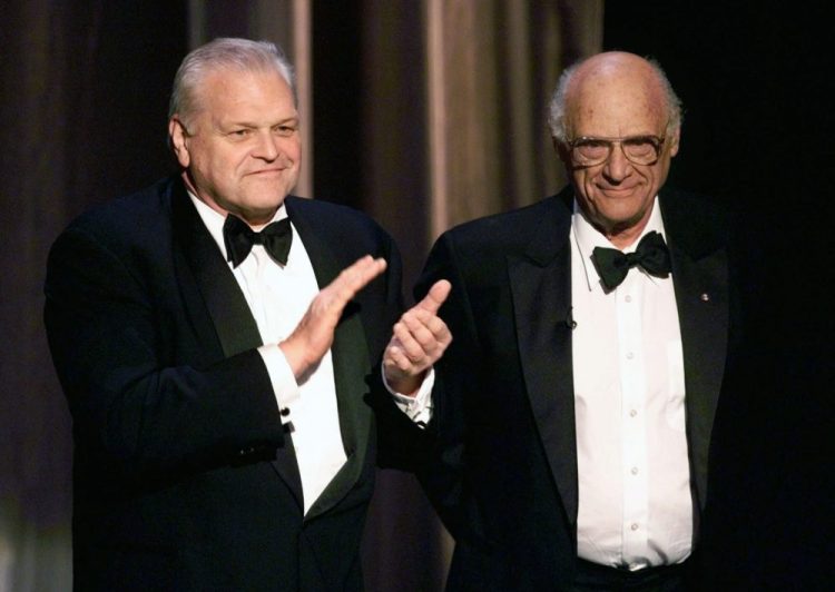 Actor Brian Dennehy, left, applauds playwright, Arthur Miller on June 6, 1999, before awarding him the Lifetime Achievement Award at the Tony Awards in New York. Dennehy died of natural causes on Wednesday in New Haven, Conn. He was 81.  