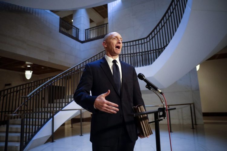 Carter Page, a foreign policy adviser to Donald Trump's 2016 presidential campaign, speaks with reporters Nov. 2, 2017, following a day of questions from the House Intelligence Committee, on Capitol Hill in Washington.