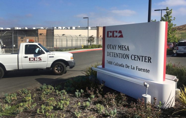 In this June 9, 2017, file photo, a vehicle drives into the Otay Mesa detention center in San Diego. The coronavirus is spreading in immigration detention including the Otay Mesa detention center, with more than 70 detainees in 12 states testing positive and hundreds of others under quarantine. 
