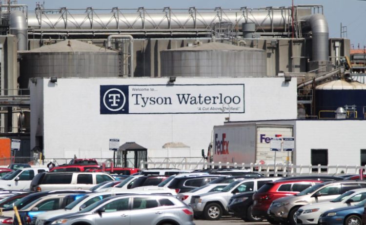 Tyson Foods suspended operations at its Waterloo, Iowa, meat processing plant on Monday after workers there tested positive for the coronavirus. The president plans to use the Defense Production Act to classify meat processing as critical infrastructure to keep production plants open.