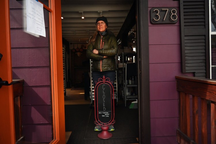 NORTH YARMOUTH, ME - MAY 6: Krista Kern Desjarlais in the doorway of her closed North Yarmouth Restaurant The Purple House. Desjarlais has not applied for the paycheck protection program because she doesn't think it will fit her business.Wednesday, May 6, 2020. (Staff Photo by Shawn Patrick Ouellette/Staff Photographer)