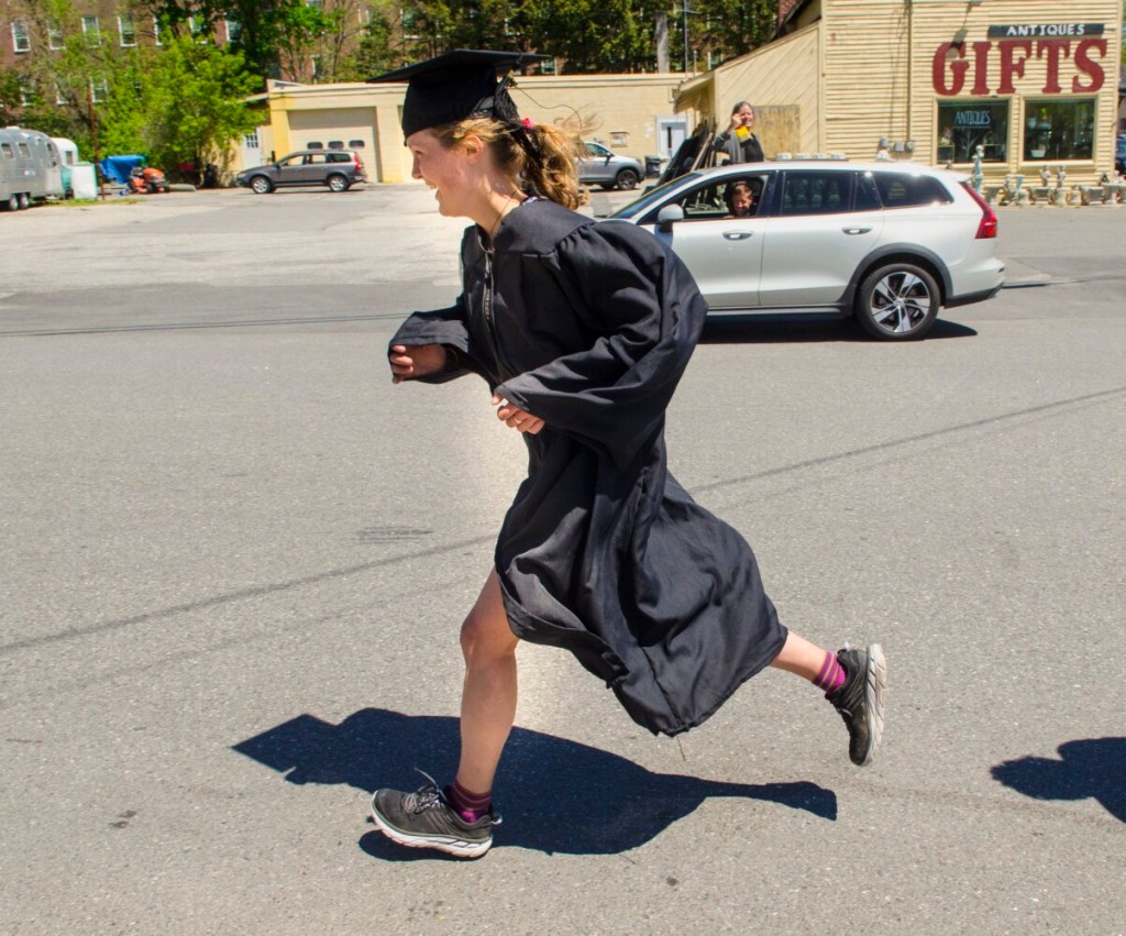 Runner in cap and gown