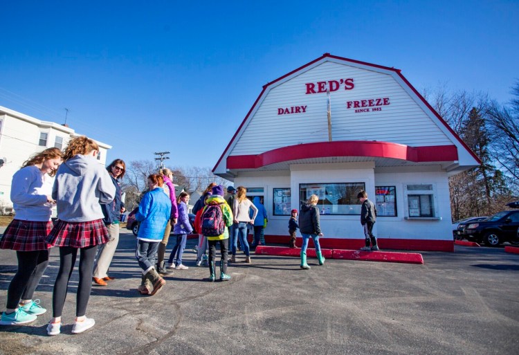 A long line forms at Red's Dairy Freeze in South Portland several years ago. It'll look a little different this year. 