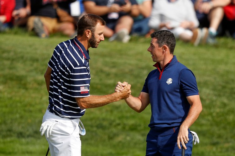 Dustin Johnson left, and Rory McIlroy will take part in a skins game to raise funds for COVID-19 relief on May 17, the first list golf on television since March.