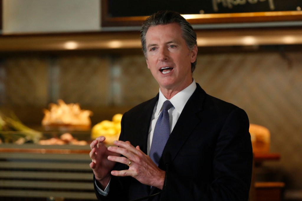 Gov. Gavin Newsom speaks during a news conference in Napa, Calif., on May 18.

