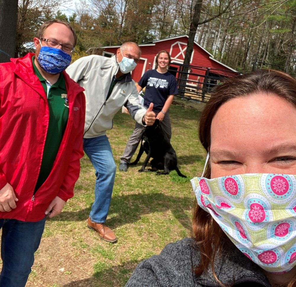 Oxford Hills principals make special delivery to high school seniors