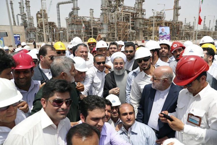 Iranian President Hassan Rouhani, center, inaugurates the Persian Gulf Star Refinery in Bandar Abbas, Iran. Five Iranian tankers likely carrying at least $45.5 million worth of gasoline and similar products are now sailing to Venezuela as of Sunday.