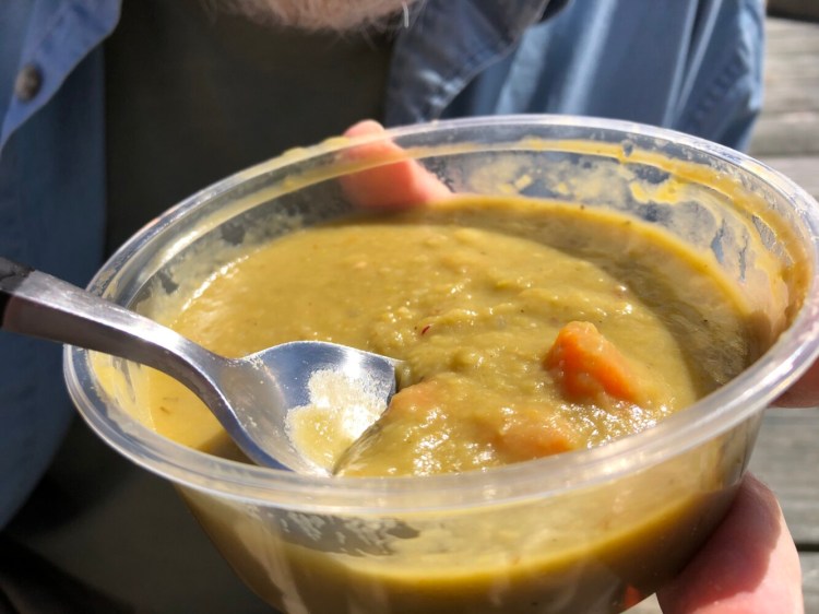 The Knotted Apron's split pea soup, with chunks of carrots, was the first course of the restaurant's three-course curbside pickup meal. 