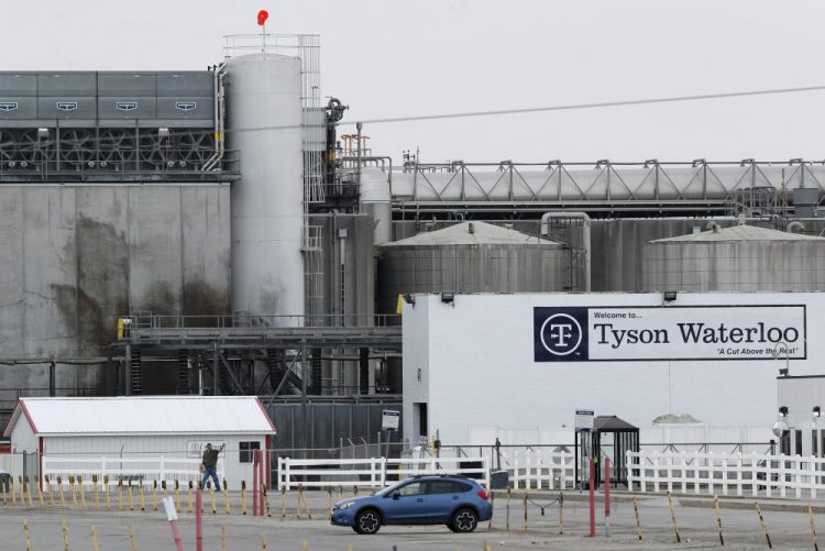 A worker leaves the Tyson Foods plant in Waterloo, Iowa in May. 