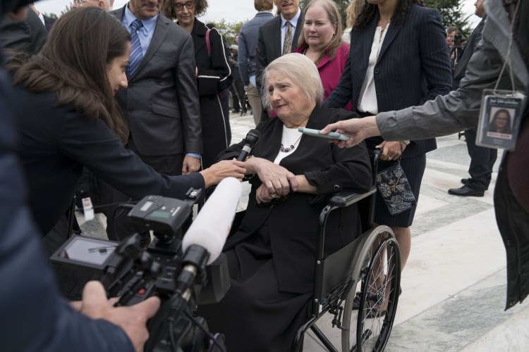Aimee Stephens speaks outside of the Supreme Court in Washington, D.C., on Oct. 8, 2019. She died Tuesday of complications from kidney failure. 