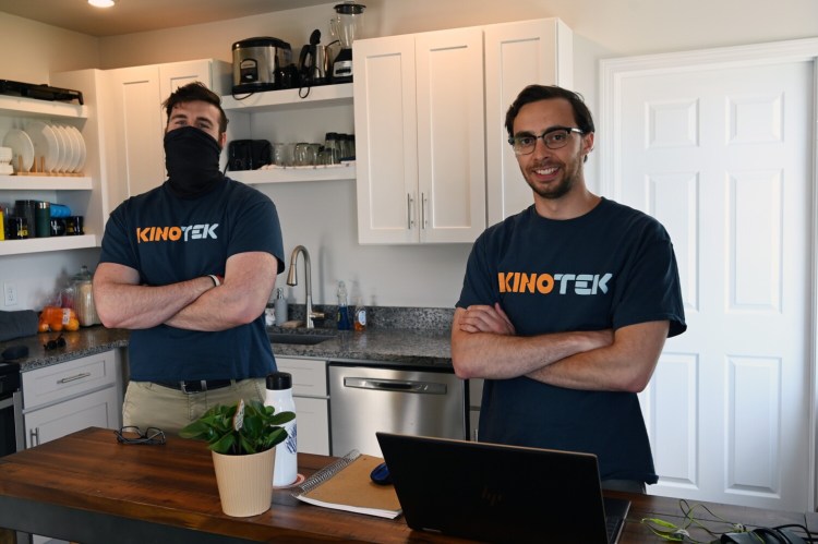 KinoTek founders David Holomakoff, left, and Justin Hafner at Hafner’s Portland apartment in June. The software startup had a virtual reality and kinesiology focus, but it shifted from sports to digital health when the pandemic changed potential clients’ interests.