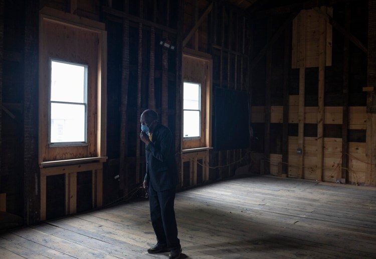 PORTLAND, ME - JUNE 11: Leonard Cummings, 85, a founder of the Committee to Restore the Abyssinian, adjusts his mask inside of the Abyssinian Meeting House in Portland on Thursday, June 11, 2020. (Staff photo by Brianna Soukup/Staff Photographer)