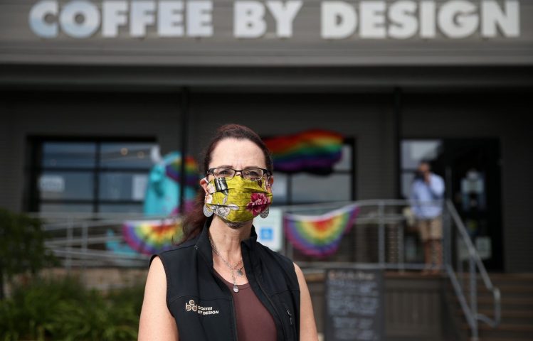 Mary Allen Lindemann, co-owner of Coffee By Design, stands in front of the local chain's Diamond Street location in Portland. Retailers throughout the state have encountered patrons who’ve expressed anger, hostility and a refusal to follow restrictions designed to prevent community spread of the coronavirus.