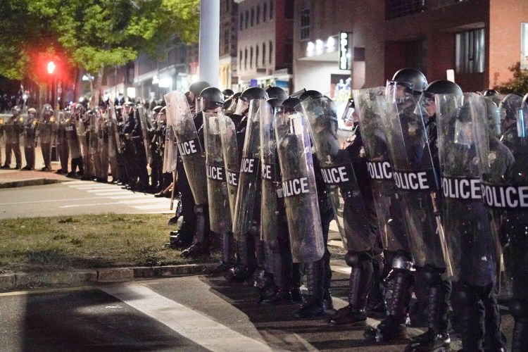 Police in riot gear form a line across Franklin Street in Portland early in the morning on June 2 during a protest against police brutality and racism.
