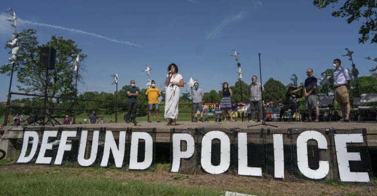 Alondra Cano, a Minneapolis City Council member, speaks during "The Path Forward" meeting at Powderhorn Park on Sunday. The focus of the meeting was the defunding of the police department, a move Cano supports. 
