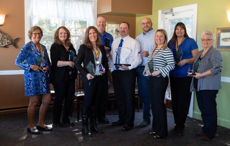 Fontaine Family Team Agents, from left, are Pat Long-Cressey, Charmaine Raby, Maria Morrissette, Paul Rondeau, Clay Larochelle, Chad Doucette, Teri Campbell, Doreen Jackson and Kelly Webb.
