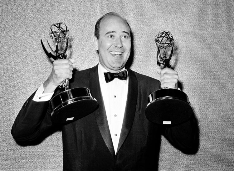 Carl Reiner shows holds two Emmy statuettes presented to him as best comedy writer for the "Dick Van Dyke Show," during the annual Emmy Awards presentation in Los Angeles in 1963. Reiner, the ingenious and versatile writer, actor and director who broke through as a “second banana” to Sid Caesar and rose to comedy’s front ranks as creator of “The Dick Van Dyke Show” and straight man to Mel Brooks’ “2000 Year Old Man,” has died at the age of 98.