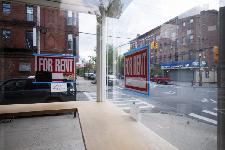 As small businesses struggle to remain open in places like Brooklyn's Red Hook neighborhood, office tenants are beginning to think twice about how much space they're renting. (AP Photo/Mark Lennihan)