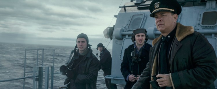 Capt Krause (Tom Hanks) with crew on the lookout for German U-Boats in TriStar Pictures' "Greyhound."